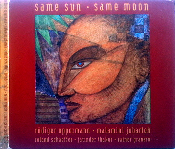Rüdiger Oppermann & Malamini Jobarteh - Same Sun Same Moon